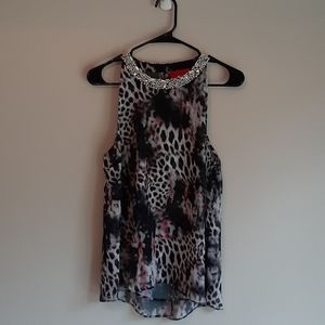 Jennifer Lopez sleeveless blouse